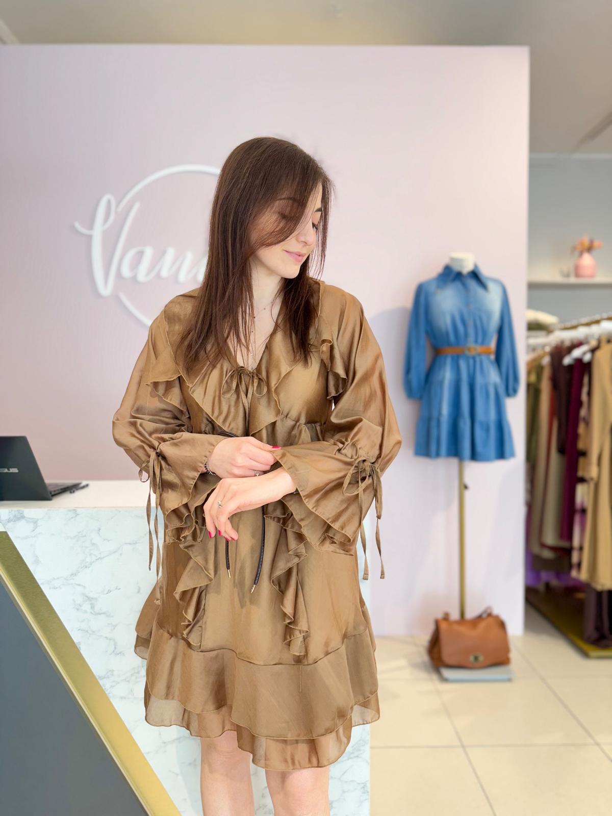 Abito in mussola con rouches